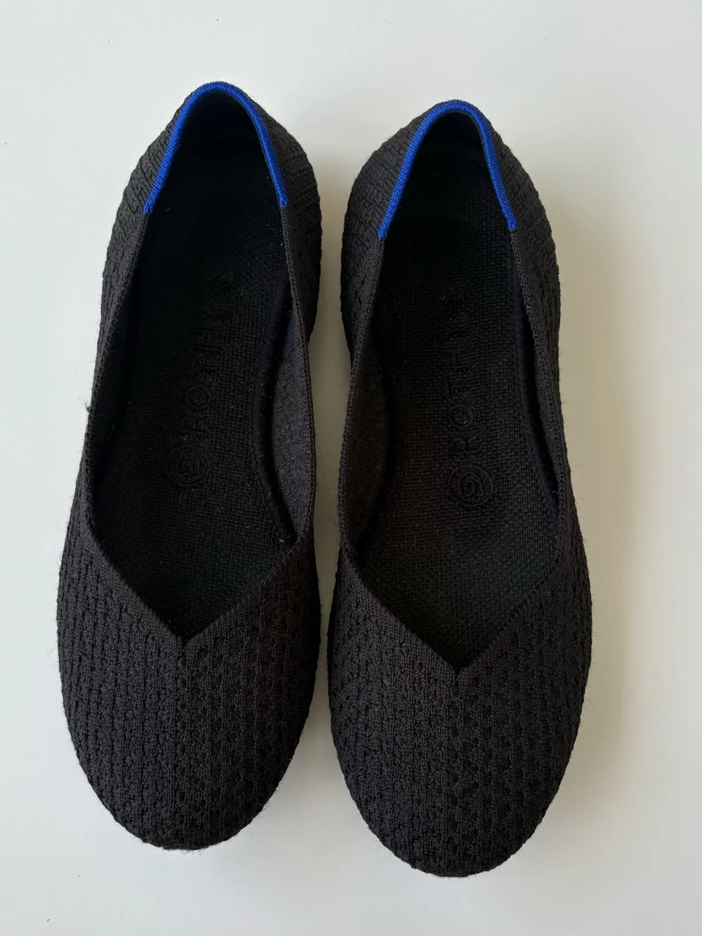 Rothy's Black Knit Ballet Flats with Blue Heel Trim. Womens size 7.5